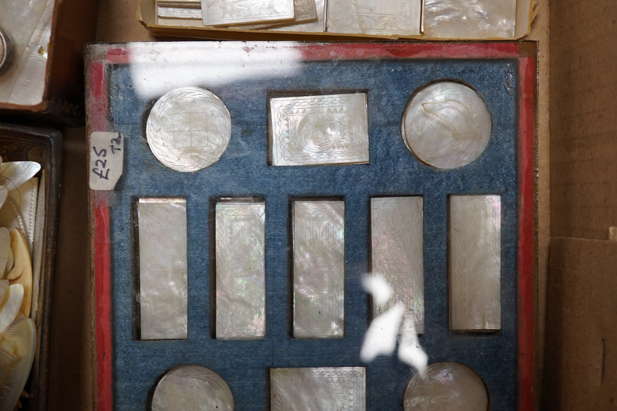 A group of 19th century Chinese mother of pearl gaming counters and accessories, together with a miniature silver cased compass